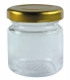 Glassbottle with golden lid, empty